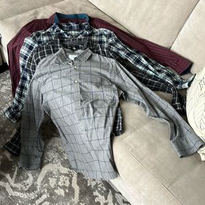 4 men’s shirts. Used but in excellent condition